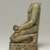 <em>Kneeling Statue of Nesbanebdjedet</em>, ca. 755-730 B.C.E. Egyptian faience, 5 3/8 x 1 7/8 x 3 1/4 in. (13.6 x 4.8 x 8.3 cm). Brooklyn Museum, Charles Edwin Wilbour Fund, 37.344E. Creative Commons-BY (Photo: Brooklyn Museum, 37.344E_left_PS11.jpg)