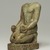  <em>Kneeling Statue of Nesbanebdjedet</em>, ca. 755-730 B.C.E. Egyptian faience, 5 3/8 x 1 7/8 x 3 1/4 in. (13.6 x 4.8 x 8.3 cm). Brooklyn Museum, Charles Edwin Wilbour Fund, 37.344E. Creative Commons-BY (Photo: Brooklyn Museum, 37.344E_threequarter_left_PS11.jpg)