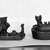  <em>Cat with Kittens</em>, ca. 664-30 B.C.E. or later. Bronze, wood, 2 3/8 x 3 7/16 x 1 15/16 in. (6.1 x 8.8 x 5 cm). Brooklyn Museum, Charles Edwin Wilbour Fund, 37.406Ea-b. Creative Commons-BY (Photo: , 37.418E_37.406E_NegD_glass_bw_SL4.jpg)