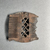 Coptic. <em>Comb</em>, 5th–7th century C.E. Wood, 3 9/16 × 3 9/16 × 3/8 in. (9 × 9 × 0.9 cm). Brooklyn Museum, Charles Edwin Wilbour Fund, 37.672E. Creative Commons-BY (Photo: Brooklyn Museum, 37.672E_overall03.JPG)