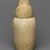  <em>Canopic Jar and Lid (Depicting a Jackal)</em>, 664-404 B.C.E. Limestone, 11 9/16 (29.3 cm) high x 5 1/4 in. (13.4 cm) diameter. Brooklyn Museum, Charles Edwin Wilbour Fund, 37.894Ea-b. Creative Commons-BY (Photo: Brooklyn Museum, 37.894Ea-b_back_PS1.jpg)