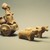 Indus Valley Culture. <em>Body of a Toy Chariot</em>, 3000-2500 B.C.E. Reddish pottery, with modern shaft and axle: 3 1/8 x 6 1/8 in. (8 x 15.5 cm). Brooklyn Museum, A. Augustus Healy Fund, 37.92. Creative Commons-BY (Photo: Brooklyn Museum, 37.92.jpg)