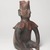 Colima. <em>Figurine</em>, 300 BCE - 300 CE. Ceramic, pigment, 12 × 7 3/8 × 6 1/2 in. (30.5 × 18.7 × 16.5 cm). Brooklyn Museum, Museum Collection Fund, 40.15. Creative Commons-BY (Photo: Brooklyn Museum, 40.15_threequarter_right_PS9.jpg)