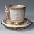 Union Porcelain Works (1863-ca. 1922). <em>"Liberty" Cup and Saucer</em>, ca. 1876. Porcelain, (a) Cup: 3 7/8 x 3 3/4 x 3 3/4 in. (9.8 x 9.5 x 9.5 cm). Brooklyn Museum, Gift of Mrs. Luke Vincent Lockwood, 40.374a-b. Creative Commons-BY (Photo: Brooklyn Museum, 40.374a-b_SL1.jpg)
