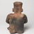 Jalisco. <em>Seated Figure of a Woman</em>, 300 BCE-300 CE. Ceramic, pigment, 10 × 6 1/2 × 5 3/4 in. (25.4 × 16.5 × 14.6 cm). Brooklyn Museum, Ella C. Woodward Memorial Fund, 40.919. Creative Commons-BY (Photo: Brooklyn Museum, 40.919_back_PS9.jpg)