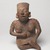 Jalisco. <em>Seated Figure of a Woman</em>, 300 BCE-300 CE. Ceramic, pigment, 10 × 6 1/2 × 5 3/4 in. (25.4 × 16.5 × 14.6 cm). Brooklyn Museum, Ella C. Woodward Memorial Fund, 40.919. Creative Commons-BY (Photo: Brooklyn Museum, 40.919_overall_PS9.jpg)