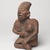 Jalisco. <em>Seated Figure of a Woman</em>, 300 BCE-300 CE. Ceramic, pigment, 10 × 6 1/2 × 5 3/4 in. (25.4 × 16.5 × 14.6 cm). Brooklyn Museum, Ella C. Woodward Memorial Fund, 40.919. Creative Commons-BY (Photo: Brooklyn Museum, 40.919_threequarter_left_PS9.jpg)