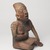 Jalisco. <em>Seated Figure of a Woman</em>, 300 BCE-300 CE. Ceramic, pigment, 10 × 6 1/2 × 5 3/4 in. (25.4 × 16.5 × 14.6 cm). Brooklyn Museum, Ella C. Woodward Memorial Fund, 40.919. Creative Commons-BY (Photo: Brooklyn Museum, 40.919_threequarter_right_PS9.jpg)