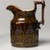 American Pottery Company (1833-1845). <em>Pitcher, "Apostle's Pitcher,"</em> after 1842. Glazed Earthenware, 9 1/4 in. H (23.5 cm). Brooklyn Museum, Gift of Arthur W. Clement, 43.128.27. Creative Commons-BY (Photo: Brooklyn Museum, 43.128.27_PS1.jpg)