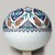  <em>Spherical Hanging Ornament</em>, 1575-1585. Ceramic; fritware, painted in black, cobalt blue, green, and red on a white slip ground under a transparent glaze, 12 3/4 × 11 3/4 × 11 1/4 in. (32.4 × 29.8 × 28.6 cm). Brooklyn Museum, Gift of Mr. and Mrs. Frederic B. Pratt, 43.24.8. Creative Commons-BY (Photo: Brooklyn Museum, 43.24.8_view1_PS9.jpg)