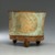 Teotihuacan. <em>Tripod Jar</em>, ca. 800 C.E. Clay, pigment, 7 1/2 x 9 x 9 in. (19.1 x 22.9 x 22.9 cm). Brooklyn Museum, Charles Stewart Smith Memorial Fund, 44.189. Creative Commons-BY (Photo: Brooklyn Museum, 44.189_side3_PS1.jpg)