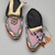 Blackfoot. <em>Pair of Men's Moccasins</em>, late 19th-early 20th century. Leather, beads, orange horse hair, tin, Each: 10 1/4 x 4 3/4 in. (26 x 12.1 cm). Brooklyn Museum, Charles Stewart Smith Memorial Fund, 46.96.9a-b. Creative Commons-BY (Photo: Brooklyn Museum, 46.96.9a-b_view1_PS2.jpg)