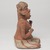 Nayarit. <em>Figurine of a Woman</em>, 100 BCE - 200 CE. Ceramic, pigment, 8 1/2 x 5 1/2 x 5 in. (21.6 x 14 x 12.7 cm). Brooklyn Museum, Frank L. Babbott Fund, 47.186.2. Creative Commons-BY (Photo: Brooklyn Museum, 47.186.2_right_PS9.jpg)