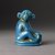  <em>Figure of Monkey Seated on Ovoid Base</em>, ca. 1352-1336 B.C.E. Faience, 2 1/8 x 1 1/8 x 1 9/16 in. (5.4 x 2.8 x 4 cm). Brooklyn Museum, Charles Edwin Wilbour Fund, 48.181. Creative Commons-BY (Photo: Brooklyn Museum, 48.181_front_SL1.jpg)