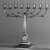 German. <em>Hanukkah Menorah</em>, ca. 1820. Silver-plate, 14 1/2 x 16 x 4 in. (36.8 x 40.6 x 10.2 cm). Brooklyn Museum, Purchased with funds given by Moses Spatt, 49.228.3. Creative Commons-BY (Photo: Brooklyn Museum, 49.228.3_bw.jpg)