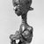Lulua. <em>Figure of a Mother Holding a Child  (Lupingu lwa Cibola)</em>, 19th century. Wood, copper alloy, palm oil, tukula, organic materials, 14 x 3 3/8 x 3 1/2 in. (35.6 x 8.6 x 8.9 cm). Brooklyn Museum, Museum Collection Fund, 50.124. Creative Commons-BY (Photo: Brooklyn Museum, 50.124_threequarter_detail_acetate_bw.jpg)