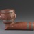 Sisseton, Sioux. <em>Inlaid Pipe Bowl with Two Faces</em>, early 19th century. Catlinite (pipestone), lead, 3 x 5 x 3 in. (7.6 x 12.7 x 7.6 cm). Brooklyn Museum, Henry L. Batterman Fund and the Frank Sherman Benson Fund, 50.67.104. Creative Commons-BY (Photo: Brooklyn Museum, 50.67.104_profile_PS9.jpg)