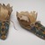 Possibly Tsuut'ina. <em>Pair of Moccasins</em>, 19th century. Hide, glass beads, 4 x 3 3/4 x 9 1/2 in. (10.2 x 9.5 x 24.1 cm). Brooklyn Museum, Henry L. Batterman Fund and Frank Sherman Benson Fund, 50.67.19a-b. Creative Commons-BY (Photo: Brooklyn Museum, 50.67.19a-b.jpg)