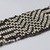 Chippewa (Anishinaabe). <em>Garter</em>, early 19th century. Yarn, garnet beads, pony beads, 11 3/4 x 1 11/16 in. (29.8 x 4.3 cm). Brooklyn Museum, Henry L. Batterman Fund and the Frank Sherman Benson Fund, 50.67.37a. Creative Commons-BY (Photo: Brooklyn Museum, 50.67.37a_detail05_PS22.jpg)