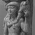 Graeco-Egyptian. <em>Calf Bearer</em>, 4th-3rd century B.C.E. Faience or glass, 3 1/4 x 2 7/16 in.  (8.2 x 6.2 cm). Brooklyn Museum, Charles Edwin Wilbour fund, 51.222. Creative Commons-BY (Photo: Brooklyn Museum, 51.222_negB_bw_IMLS.jpg)