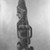  <em>Figure (Uli)</em>, 19th or early 20th century. Wood, Turbo petholatus opercula, pigment, fibers, organic materials, 59 x 14 1/4 x 18 1/2 in. (149.9 x 36.2 x 47 cm). Brooklyn Museum, A. Augustus Healy Fund, 51.234. Creative Commons-BY (Photo: Brooklyn Museum, 51.234_side_acetate_bw.jpg)