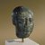  <em>Idealized Head</em>, ca. 300 B.C.E. Basalt, 4 13/16 x 3 1/16 x 4 1/2 in. (12.3 x 7.7 x 11.5 cm). Brooklyn Museum, Charles Edwin Wilbour Fund, 55.178. Creative Commons-BY (Photo: Brooklyn Museum, 55.178_SL1.jpg)