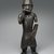 Edo. <em>Figure of a Hornblower (Ikpakohẹn)</em>, ca. 1504-50. Copper alloy, iron, 24 1/2 x 8 1/2 x 6 in. (62.2 x 21.6 x 15.2 cm). Brooklyn Museum, Gift of Mr. and Mrs. Alastair B. Martin, the Guennol Collection, 55.87. Creative Commons-BY (Photo: Brooklyn Museum, 55.87_front_SL1.jpg)