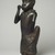 Edo. <em>Figure of a Hornblower</em>, ca. 1504-50. Copper alloy, iron, 24 1/2 x 8 1/2 x 6 in. (62.2 x 21.6 x 15.2 cm). Brooklyn Museum, Gift of Mr. and Mrs. Alastair B. Martin, the Guennol Collection, 55.87. Creative Commons-BY (Photo: Brooklyn Museum, 55.87_threequarter_left_PS11.jpg)