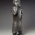 Edo. <em>Figure of a Hornblower (Ikpakohẹn)</em>, ca. 1504-50. Copper alloy, iron, 24 1/2 x 8 1/2 x 6 in. (62.2 x 21.6 x 15.2 cm). Brooklyn Museum, Gift of Mr. and Mrs. Alastair B. Martin, the Guennol Collection, 55.87. Creative Commons-BY (Photo: Brooklyn Museum, 55.87_view2_SL4.jpg)