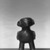 Unknown. <em>Standing Figure</em>, early 20th century. Stone, 6 1/4 x 3 1/9 x 3 1/5 in. (16.2 x 9.9 x 8.9 cm). Brooklyn Museum, Gift of Arturo and Paul Peralta-Ramos, 56.6.38. Creative Commons-BY (Photo: Brooklyn Museum, 56.6.38_acetate_bw.jpg)
