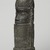 Edo. <em>Benin Head</em>, early 20th century. Copper alloy, 14 15/16 × 5 11/16 in. (38 × 14.5 cm). Brooklyn Museum, Gift of Arturo and Paul Peralta-Ramos, 56.6.66. Creative Commons-BY (Photo: Brooklyn Museum, 56.6.66_threequarter_left_PS11.jpg)
