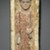 Coptic. <em>Funerary Stela with Boy Standing in a Niche</em>, 4th-5th century C.E. Limestone, ancient and modern paint in ochre, dark terracotta, brown, black and flesh-tone, 27 9/16 x 9 5/8 x 6 1/2 in. (70 x 24.5 x 16.5 cm). Brooklyn Museum, Charles Edwin Wilbour Fund, 58.129. Creative Commons-BY (Photo: Brooklyn Museum, 58.129_PS2.jpg)