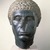  <em>Head of an Egyptian Official</em>, ca. 50 B.C.E. Diorite, 16 5/16 x 11 1/4 x 13 7/8 in. (41.4 x 28.5 x 35.2 cm). Brooklyn Museum, Charles Edwin Wilbour Fund, 58.30. Creative Commons-BY (Photo: Brooklyn Museum, 58.30_SL1.jpg)