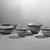 Josiah Wedgwood & Sons Ltd. (founded 1759). <em>Miniature Tea Bowl</em>, ca. 1800. Stoneware, Height x Diameter of Tea Bowl: 1 1/4 x 1 15/16 in. (3.2 x 4.9 cm). Brooklyn Museum, Gift of Emily Winthrop Miles, 61.199.66. Creative Commons-BY (Photo: , 61.199.64_61.199.66_61.199.67_61.199.68_acetate_bw.jpg)