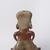 Nayarit. <em>Female Figure</em>, 100-300. Ceramic, 13 × 9 1/2 × 5 1/2 in. (33 × 24.1 × 14 cm). Brooklyn Museum, Purchased with funds given by Joseph F. McCrindle, 64.12. Creative Commons-BY (Photo: Brooklyn Museum, 64.12_back_PS20.jpg)