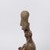 Nayarit. <em>Female Figure</em>, 100-300. Ceramic, 13 × 9 1/2 × 5 1/2 in. (33 × 24.1 × 14 cm). Brooklyn Museum, Purchased with funds given by Joseph F. McCrindle, 64.12. Creative Commons-BY (Photo: Brooklyn Museum, 64.12_side_left_PS20.jpg)