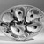 Thomas C. Smith (American, 1815-1901). <em>Oyster Plate</em>, patented January 4, 1881. Porcelain, 3/4 x 8 5/8 x 6 5/8 in. (1.9 x 21.9 x 16.8 cm). Brooklyn Museum, H. Randolph Lever Fund, 66.182. Creative Commons-BY (Photo: Brooklyn Museum, 66.182_front_acetate_bw.jpg)