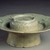  <em>Cup Stand</em>, late 12th-early 13th century. Porcelaneous stoneware with celadon glaze, Height: 2 3/16 in. (5.5 cm). Brooklyn Museum, Gift of Paul E. Manheim, 67.199.13. Creative Commons-BY (Photo: Brooklyn Museum, 67.199.13.jpg)