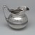 Tiffany & Company (American, founded 1853). <em>Cream Pitcher</em>, ca. 1868. Silver, 5 3/4 x 5 3/8 x 4 in. (14.6 x 13.7 x 10.2 cm). Brooklyn Museum, Gift of Eleanor Keveney in memory of Clarence A. Pratt, 71.144.5. Creative Commons-BY (Photo: Brooklyn Museum, 71.144.5_right.jpg)