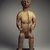 Possibly Wobe. <em>Seated Male Figure</em>, late 19th-early 20th century. Wood, metal studs, metal base, height (with base): 28 3/4 x 10 x 7 in. (73 x 25.4 x 17.8 cm). Brooklyn Museum, Gift of Fernandez Arman to the Jennie Simpson Educational Collection of African Art, 72.102.6. Creative Commons-BY (Photo: Brooklyn Museum, 72.102.6.jpg)