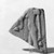  <em>Female Offering Bearer</em>, 4th century B.C.E. Limestone, 5 7/16 × 4 7/16 × 7/8 in. (13.8 × 11.2 × 2.3 cm). Brooklyn Museum, Charles Edwin Wilbour Fund, 72.12. Creative Commons-BY (Photo: Brooklyn Museum, 72.12_negA_bw_IMLS.jpg)