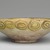  <em>Bowl Depicting a Cheetah</em>, 10th century. Ceramic; earthenware, painted in yellow-staining black slip on a white slip ground under a transparent glaze, 3 3/8 x 8 7/8 in. (8.5 x 22.5 cm). Brooklyn Museum, Frederick Loeser Fund, 73.165. Creative Commons-BY (Photo: Brooklyn Museum, 73.165_side_PS2.jpg)