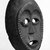 Igala. <em>Ovoid-Shaped Face Mask</em>, early 20th century. Dark wood, 10 3/4 x 6 5/8 x 3 1/4 in. (27.3 x 16.8 x 8.2 cm). Brooklyn Museum, Gift of Mr. and Mrs. J. Gordon Douglas III, 74.211.5. Creative Commons-BY (Photo: Brooklyn Museum, 74.211.5_bw.jpg)