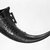 Tikar. <em>Drinking Horn</em>, late 19th or early 20th century. Buffalo horn, accumulated materials, 12 3/8 x 8 x 2 3/4 in. (31.4 x 20.3 x 7.0 cm). Brooklyn Museum, Gift of Dr. and Mrs. Willi Riese to the Jennie Simpson Educational Collection of African Art, 74.217.3. Creative Commons-BY (Photo: Brooklyn Museum, 74.217.3_bw.jpg)