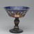  <em>Painted Stemmed Cup</em>, late 19th century. Translucent deep blue glass; free blown and enameled; tooled on the pontil, 4 7/8 x 5 in. (12.4 x 12.7 cm). Brooklyn Museum, Designated Purchase Fund, 76.11. Creative Commons-BY (Photo: Brooklyn Museum, 76.11_side1_PS2.jpg)