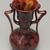 George E. Ohr (American, 1857-1918). <em>Vase</em>, ca. 1900. Glazed earthenware, H: 9 1/4 in. (23.5 cm). Brooklyn Museum, H. Randolph Lever Fund, 76.64. Creative Commons-BY (Photo: Brooklyn Museum, 76.64_detail_PS6.jpg)