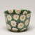 Ogata Kenzan (Japanese, 1663-1743). <em>Mukozuke (Sweetmeat dish)</em>, 18th century. Stoneware with enamel background and paper-resist blossoms with enamel centers, 2 3/16 x 3 1/8 in. (5.6 x 7.9 cm). Brooklyn Museum, Purchase gift of the J. Aron Charitable Foundation, Inc., 78.208. Creative Commons-BY (Photo: Brooklyn Museum, 78.208_view01_PS11.jpg)