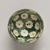 Ogata Kenzan (Japanese, 1663-1743). <em>Mukozuke (Sweetmeat dish)</em>, 18th century. Stoneware with enamel background and paper-resist blossoms with enamel centers, 2 3/16 x 3 1/8 in. (5.6 x 7.9 cm). Brooklyn Museum, Purchase gift of the J. Aron Charitable Foundation, Inc., 78.208. Creative Commons-BY (Photo: Brooklyn Museum, 78.208_view03_PS11.jpg)