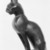  <em>Cat (Bastet)</em>, 664-343 B.C.E. Bronze, 5 1/4 x 1 5/8 x 3 3/4 in. (13.3 x 4.1 x 9.5 cm). Brooklyn Museum, Gift of Mrs. Nasli Heeramaneck, 78.243. Creative Commons-BY (Photo: Brooklyn Museum, 78.243_NegB_back_bw_SL3.jpg)