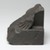  <em>Fragment of the Feet and Base of a Statue</em>, 664-332 B.C.E. Siltstone or Greywacke, 4 5/8 x 4 11/16 x 4 13/16 in. (11.7 x 11.9 x 12.2 cm). Brooklyn Museum, Gift of John D. Hoag, 79.31. Creative Commons-BY (Photo: Brooklyn Museum, 79.31_profile_left_PS2.jpg)